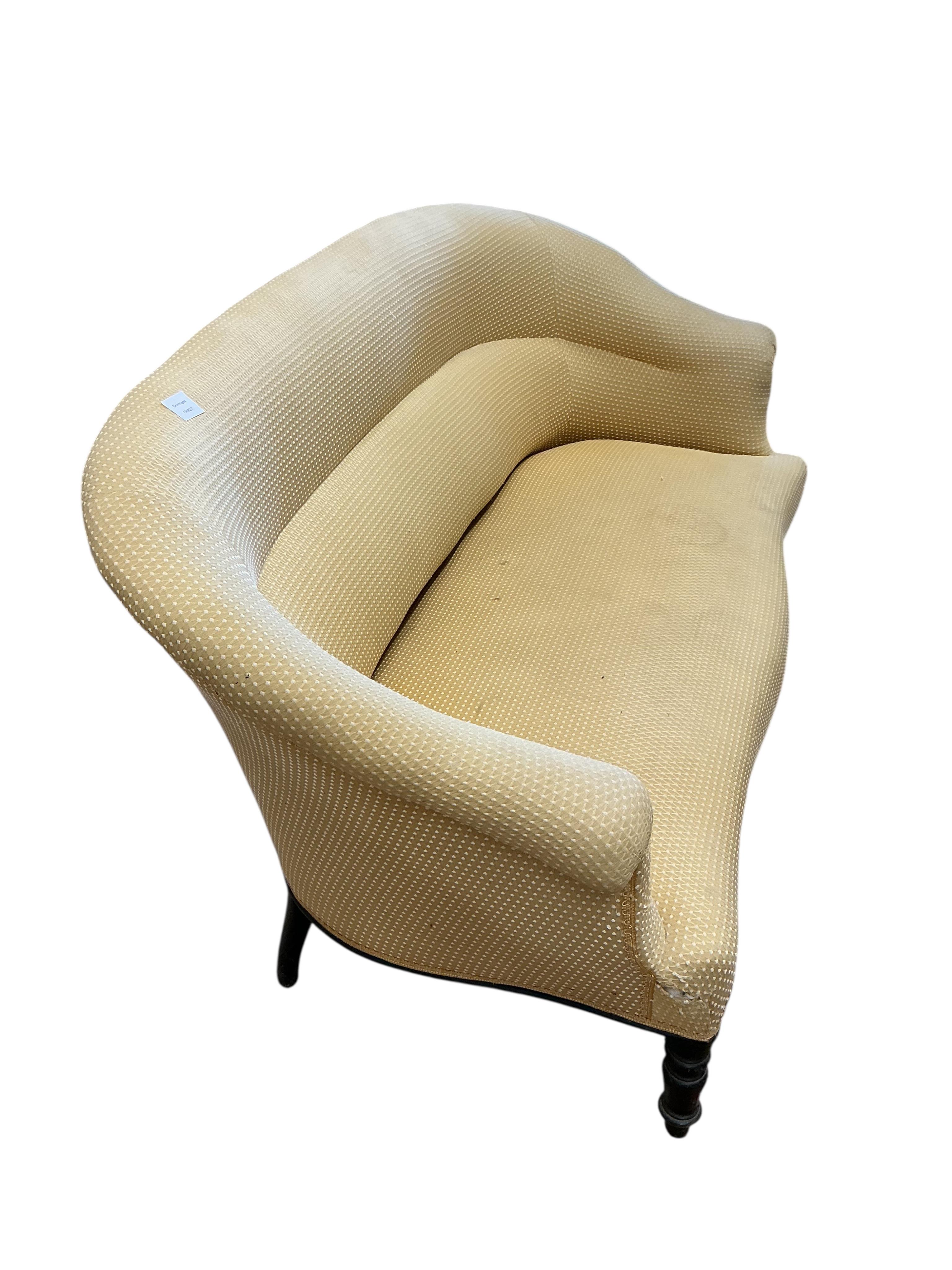 A late Victorian upholstered tub framed settee, width 150cm, depth 66cm, height 79cm